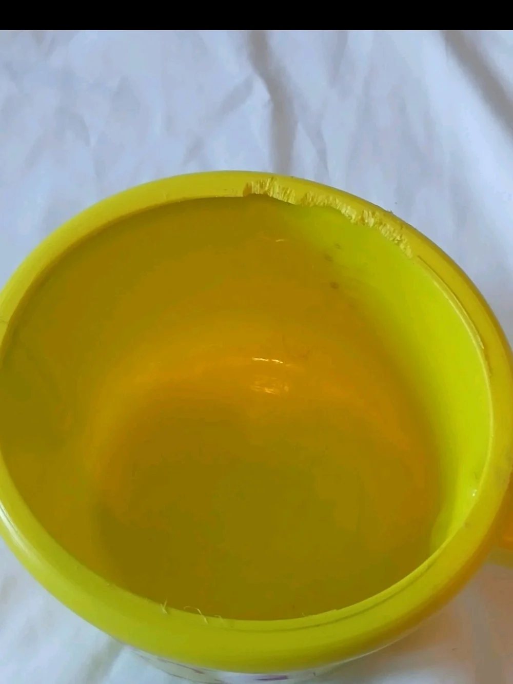 The First Years Yellow Smiley Toy Cooking Pot with Handle for Ages 12-18 Months